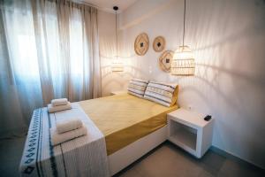 Postel nebo postele na pokoji v ubytování K Villas + 37 fotografií