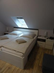 Postel nebo postele na pokoji v ubytování Ferienwohnung Ehmann