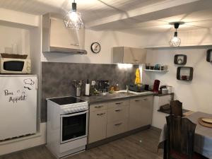 Köök või kööginurk majutusasutuses le petit champliman