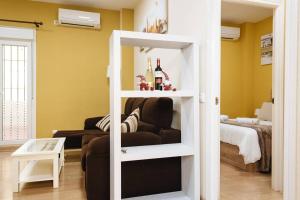 Posteľ alebo postele v izbe v ubytovaní Cozy and well located apartment in the center of Seville