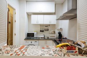 Kuchyňa alebo kuchynka v ubytovaní Cozy and well located apartment in the center of Seville