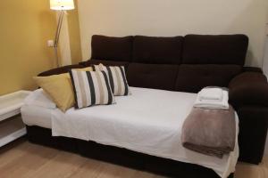 Posteľ alebo postele v izbe v ubytovaní Cozy and well located apartment in the center of Seville