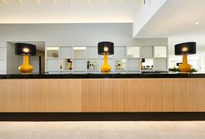 Kuchyňa alebo kuchynka v ubytovaní Hoposa Hotel & Apartaments VillaConcha