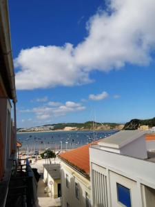 a view of a body of water from a building at Hotel Atlântica in São Martinho do Porto