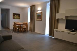 Μια τηλεόραση ή/και κέντρο ψυχαγωγίας στο Appartamento Casa Alpi