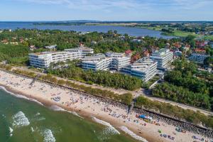 an aerial view of a beach and buildings at Dune Resort Mielno - B in Mielno