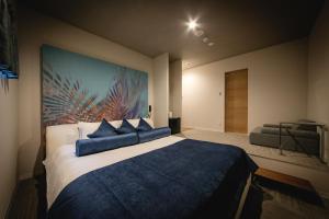 Postelja oz. postelje v sobi nastanitve HOTEL BLAX