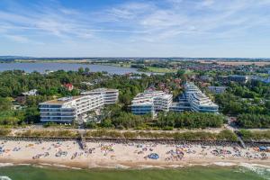 an aerial view of a beach and buildings at Dune Resort Mielno - C in Mielno