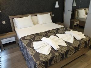 Ένα ή περισσότερα κρεβάτια σε δωμάτιο στο MitProt Panorama Bay 2 luks apartment 102