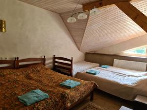 Säng eller sängar i ett rum på Vila Sanzila