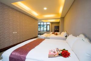 Letto o letti in una camera di 礁溪景觀溫泉會館