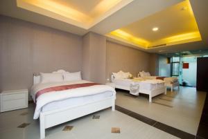 Letto o letti in una camera di 礁溪景觀溫泉會館