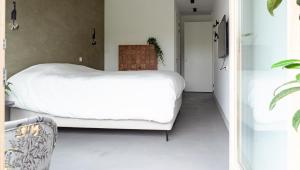 Letto o letti in una camera di Onze Kas