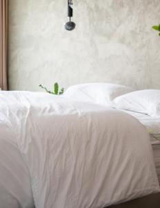 Letto o letti in una camera di Onze Kas