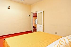 Postel nebo postele na pokoji v ubytování Merlyn Villa