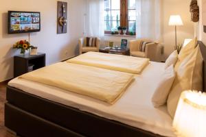 Postel nebo postele na pokoji v ubytování Hotel Mutter-Bahr