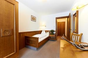 Postel nebo postele na pokoji v ubytování Landhotel Post