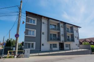 a building on the side of a street at Rania Apartments in Cluj-Napoca