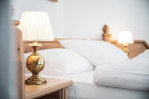 Posteľ alebo postele v izbe v ubytovaní Hotel Chalet Corso