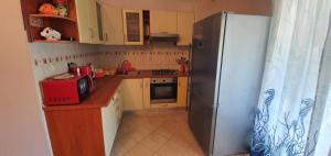 Kuchyň nebo kuchyňský kout v ubytování Apartmani Barbara App2 + 21 fotografií