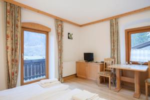 Voodi või voodid majutusasutuse Hotel Kammerhof toas