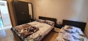 Postel nebo postele na pokoji v ubytování Apartmani Barbara App2