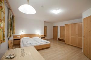 Voodi või voodid majutusasutuse Hotel Kammerhof toas