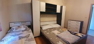 Postel nebo postele na pokoji v ubytování Apartmani Barbara App2