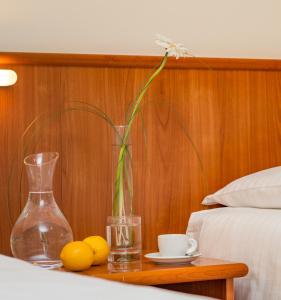 Postel nebo postele na pokoji v ubytování Hotel Casa Del Pellegrino