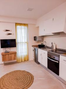 Kuchnia lub aneks kuchenny w obiekcie Bonefish Apartment