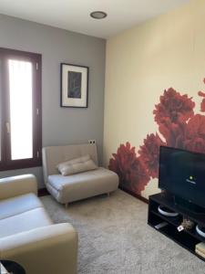 Posezení v ubytování innCádizPenthouse Palacio de Valdeavellano