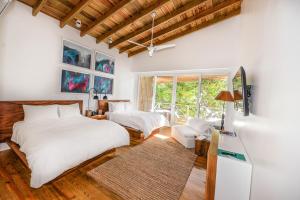 Postel nebo postele na pokoji v ubytování Ibagari Boutique Hotel + 37 fotografií