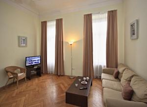 TV a/nebo společenská místnost v ubytování River View Residence