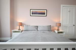 Posteľ alebo postele v izbe v ubytovaní Upper Alta Apartment