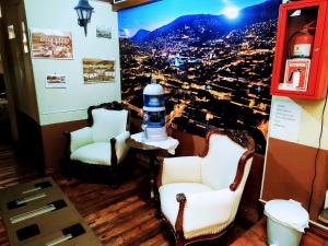 Posezení v ubytování Hostal Latitud Ecuem