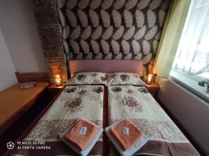 Posteľ alebo postele v izbe v ubytovaní Motel Podkova