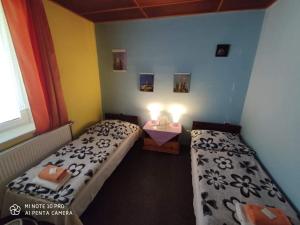 Posteľ alebo postele v izbe v ubytovaní Motel Podkova