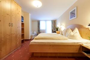 Postel nebo postele na pokoji v ubytování Landhotel Post