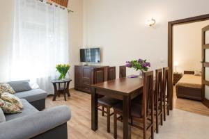 Televízia a/alebo spoločenská miestnosť v ubytovaní Vanilla 6 Apartment