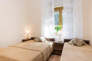 Posteľ alebo postele v izbe v ubytovaní Vanilla 6 Apartment