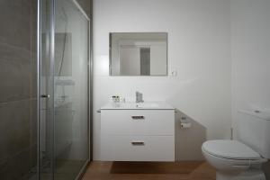 Et badeværelse på The Wish São Roque + 11 billeder