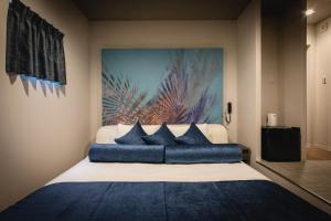 Postelja oz. postelje v sobi nastanitve HOTEL BLAX