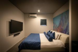 Postelja oz. postelje v sobi nastanitve HOTEL BLAX