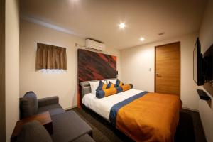 Postelja oz. postelje v sobi nastanitve HOTEL BLAX
