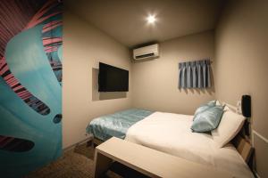 Postelja oz. postelje v sobi nastanitve HOTEL BLAX