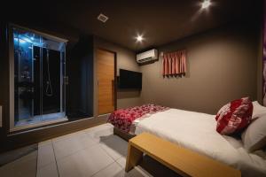 Postelja oz. postelje v sobi nastanitve HOTEL BLAX