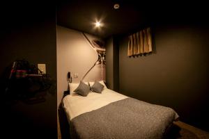Postelja oz. postelje v sobi nastanitve HOTEL BLAX