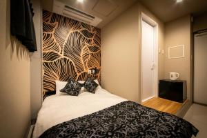 Postelja oz. postelje v sobi nastanitve HOTEL BLAX