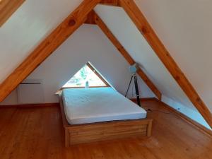 A bed or beds in a room at Gite kerblouc'h