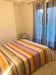 A bed or beds in a room at Alle Torri